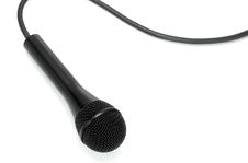Classic Black Microphone Lying On White From Above Stock Photography