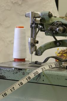 Sewing Machine With A Wedding Dress Background Stock Photos Sewing Machine With A Wedding Dress Background Stock Photos
