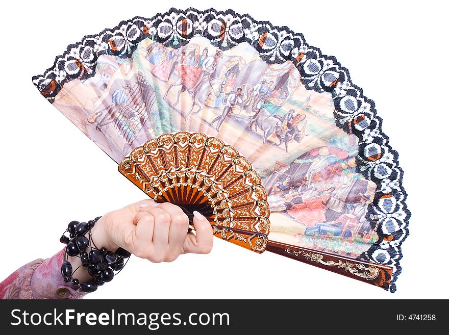 Fan in a hand with color picture. Fan in a hand with color picture