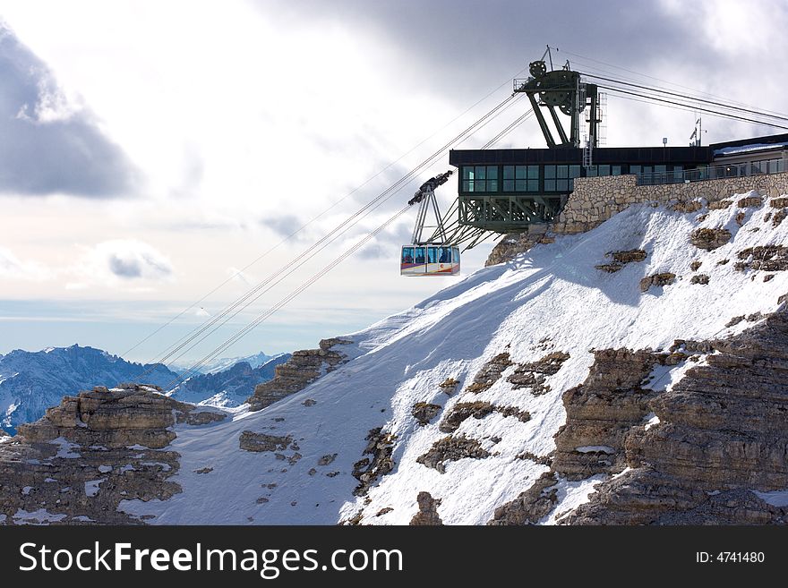 Cablecar arriving or departing from station in the mountains
