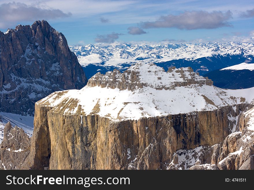 Beautiful winter mountain landscape in Italian Dolomites. Fassa Valley, popular ski resort.