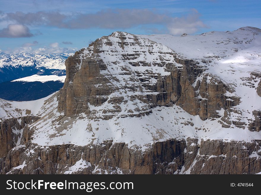 Beautiful winter mountain landscape in Italian Dolomites. Fassa Valley, popular ski resort.