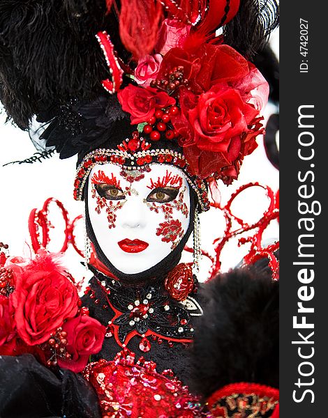 Red rose and black costume at the Venice Carnival. Red rose and black costume at the Venice Carnival
