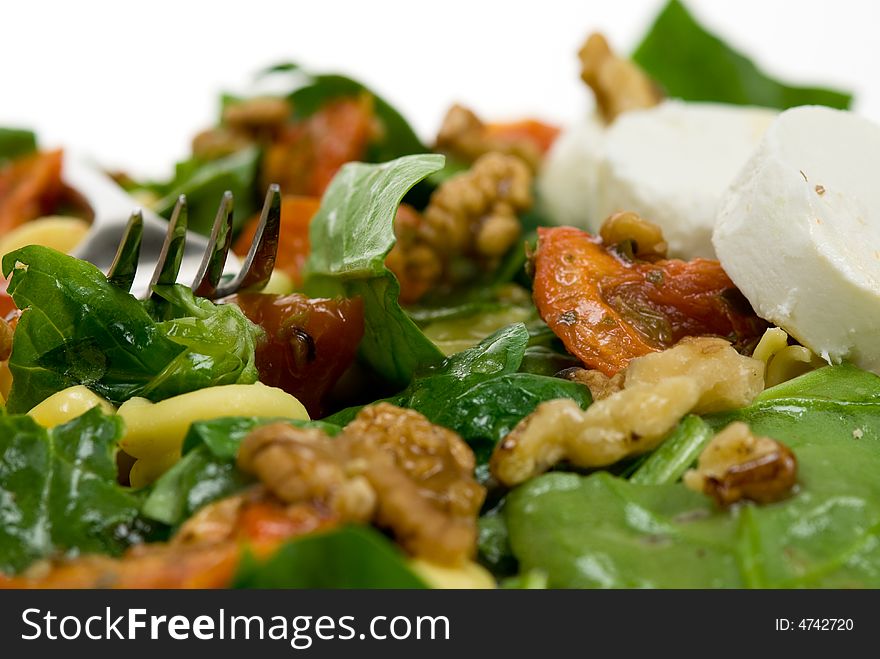 Fresh and healthy salad isolated on a white background