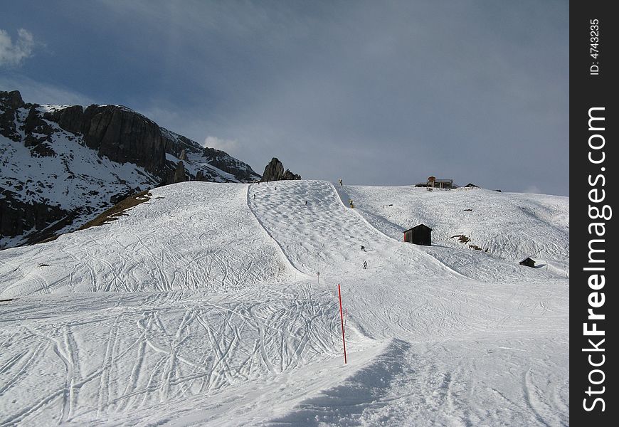 A gibbous ski slope in the dolomites, Italy