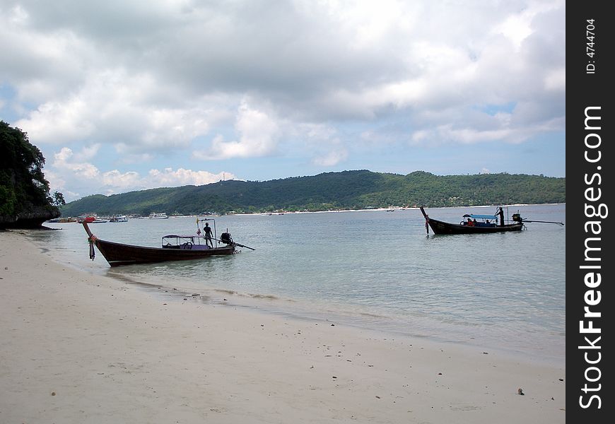 Longtail boats off Monkey Beach, Phi Phi Island, Thailand