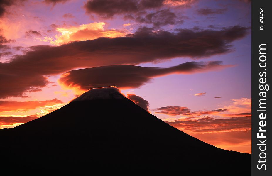 A fiery sunrise over the silhouette of sacred Fuji-2. A fiery sunrise over the silhouette of sacred Fuji-2