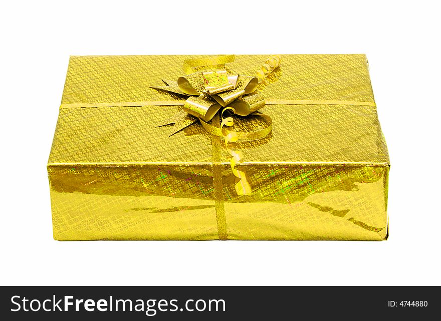 Yellow celebratory gift box isolated on white