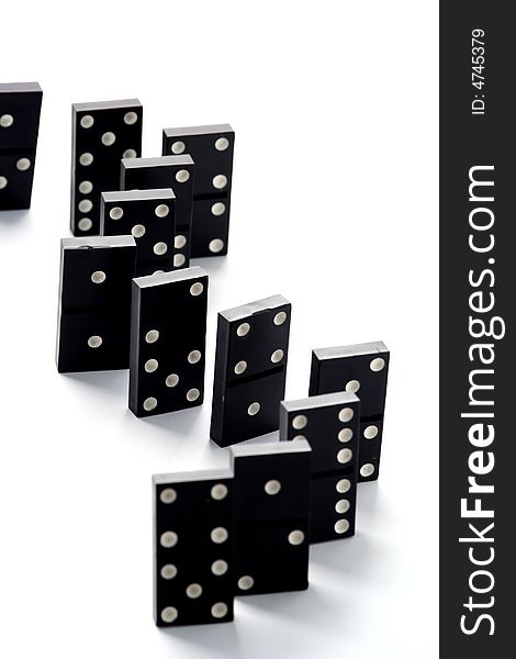 Dominoes isolated in dark background