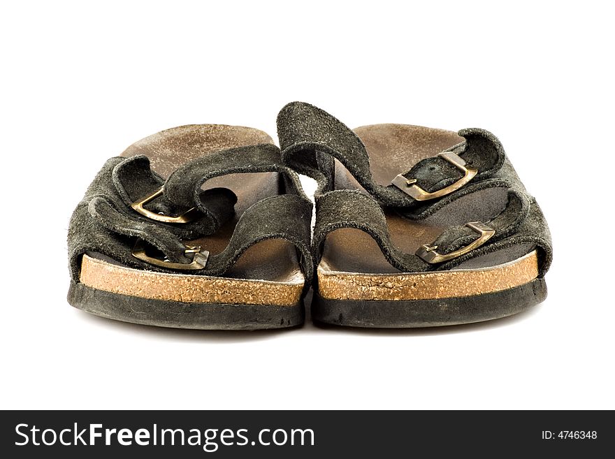 Old grungy sandal isolated on white