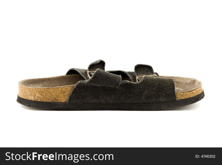 Old grungy sandal isolated on white background