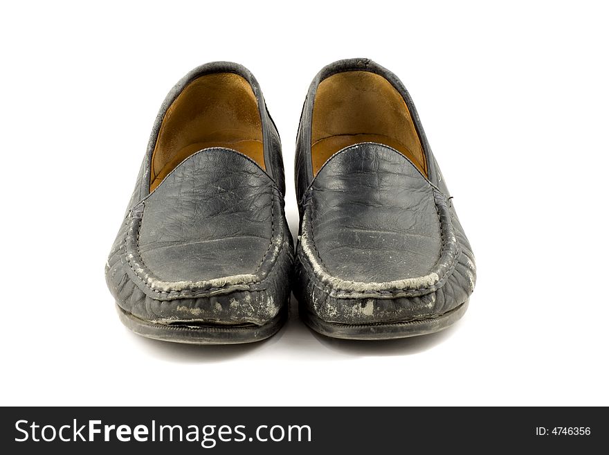 Old grungy womens shoe isolated on white background