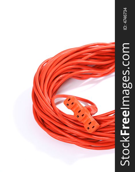 A 100 foot orange extension cord coiled up with a three way splitter