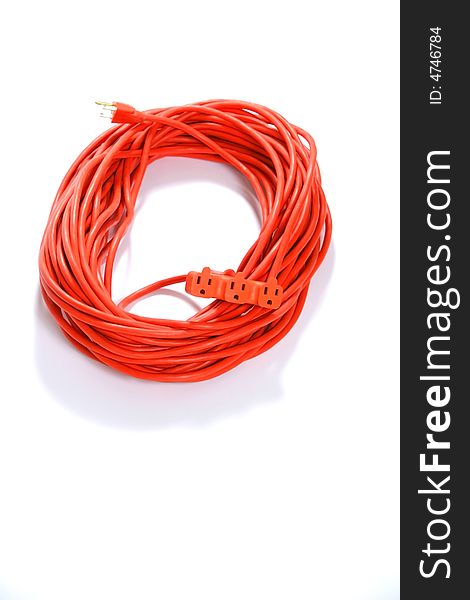A 100 foot orange extension cord coiled up with a three way splitter