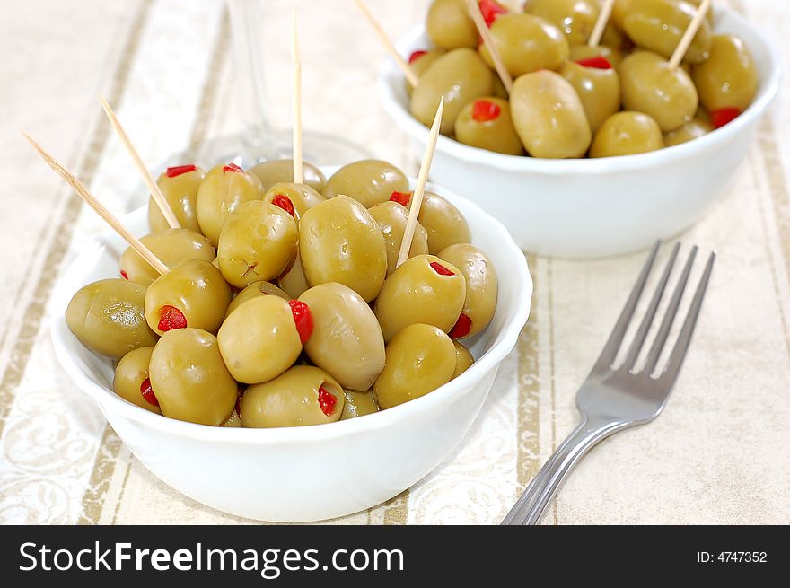 Green olives, stuffed with red peppers high resolution image. Green olives, stuffed with red peppers high resolution image