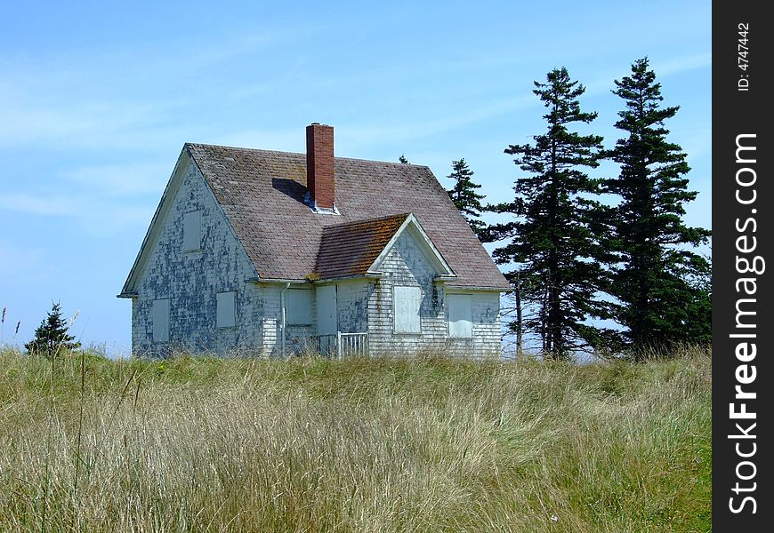 Old abandoned boarded up house, on Moshers Island Lighthouse Lahave Lunenburg County Nova Scotia Canada. Old abandoned boarded up house, on Moshers Island Lighthouse Lahave Lunenburg County Nova Scotia Canada