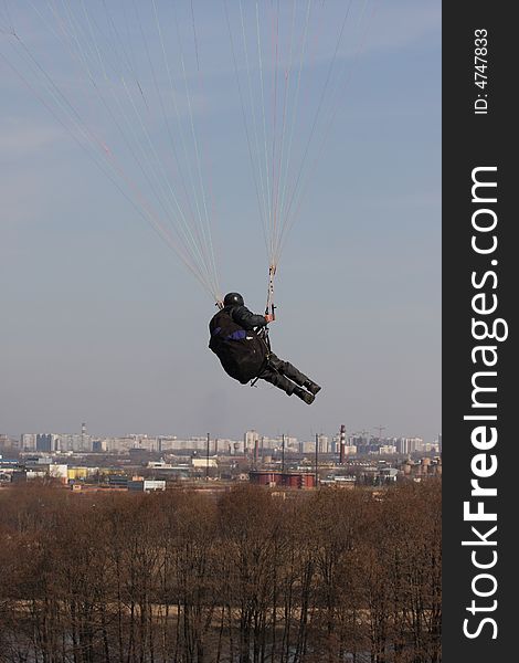Parachute, the sky, air, slings, red, rest, a hobby, spring, a city, travel, the earth, houses, a landscape, sports. Parachute, the sky, air, slings, red, rest, a hobby, spring, a city, travel, the earth, houses, a landscape, sports