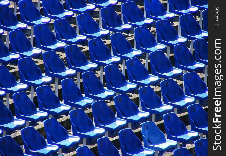 Rows of the blue sits waiting for people