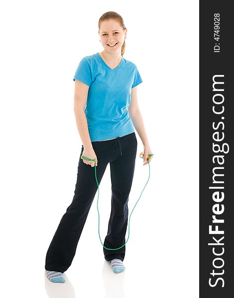 The young woman with the skipping rope isolated on a white background