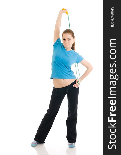 The young woman with the skipping rope isolated on a white background