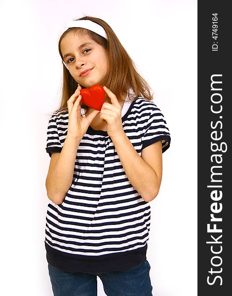 Little girl  holding a valentine heart