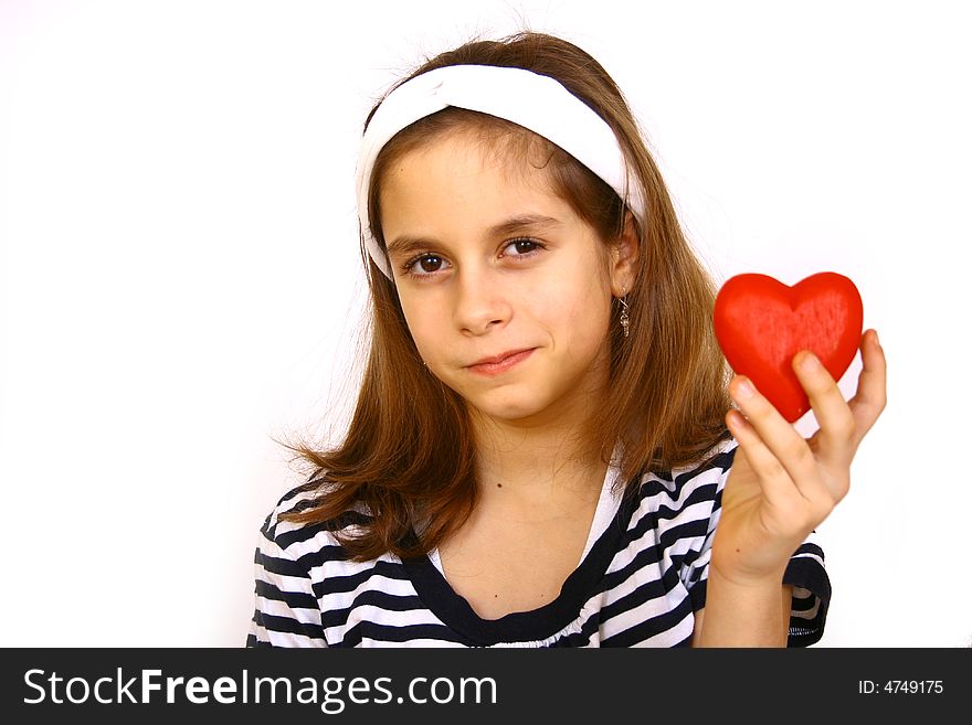 Little girl  holding a valentine heart