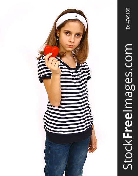 Little girl  holding a valentine heart