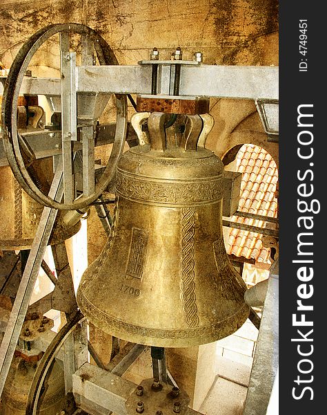 Bell in ancient cathedral - toned picture in retro style. Bell in ancient cathedral - toned picture in retro style