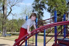 Boy On Playground Stock Image
