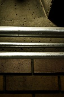 Close Up Of Metal Pipe Railings Against A Concrete Stock Image Close Up Of Metal Pipe Railings Against A Concrete Stock Image