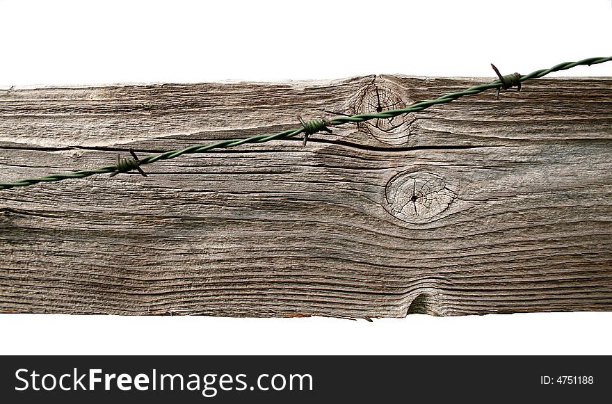 Barbwire on wooden board for a background