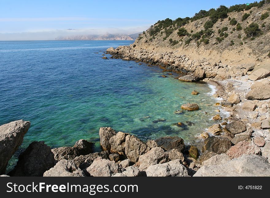 A sea and rocks is a beautiful coastline