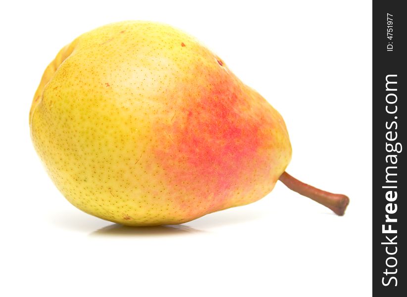 The ripe pear isolated on the white