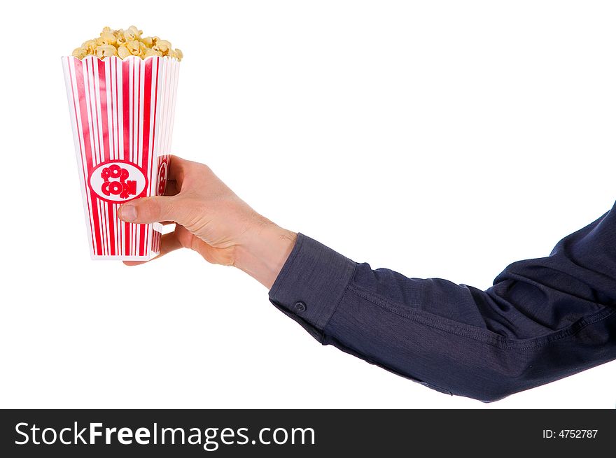 Man giving some popcorn at a movie. Man giving some popcorn at a movie