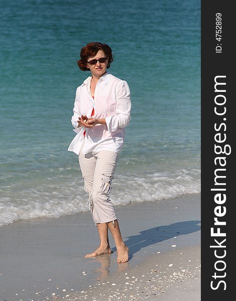 Girl Collecting Sea Shells