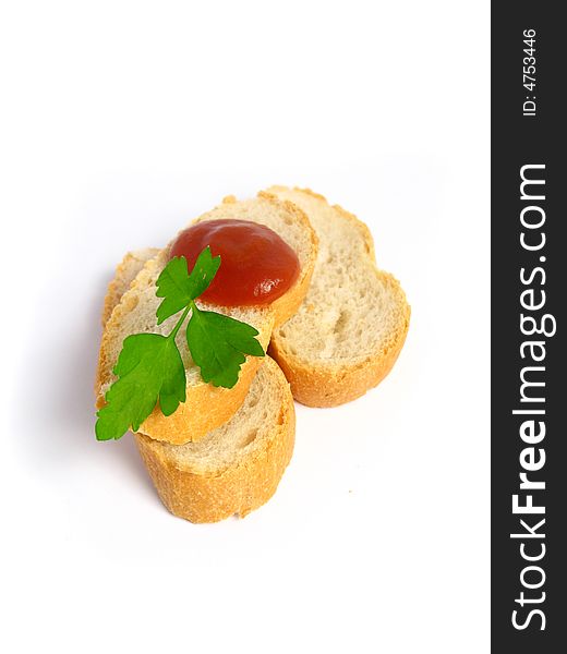 Isolated Toasts with ketchup and parsley