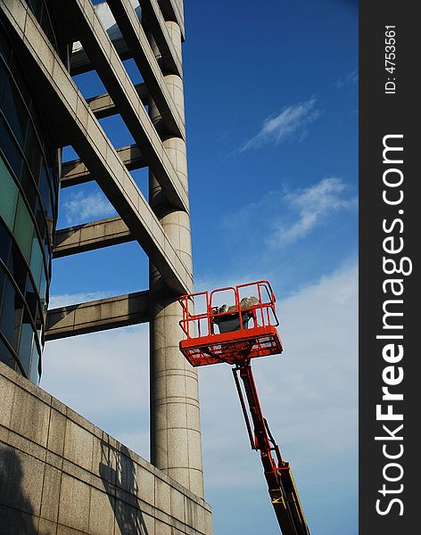 Construction of a building with cloudy sky. Construction of a building with cloudy sky