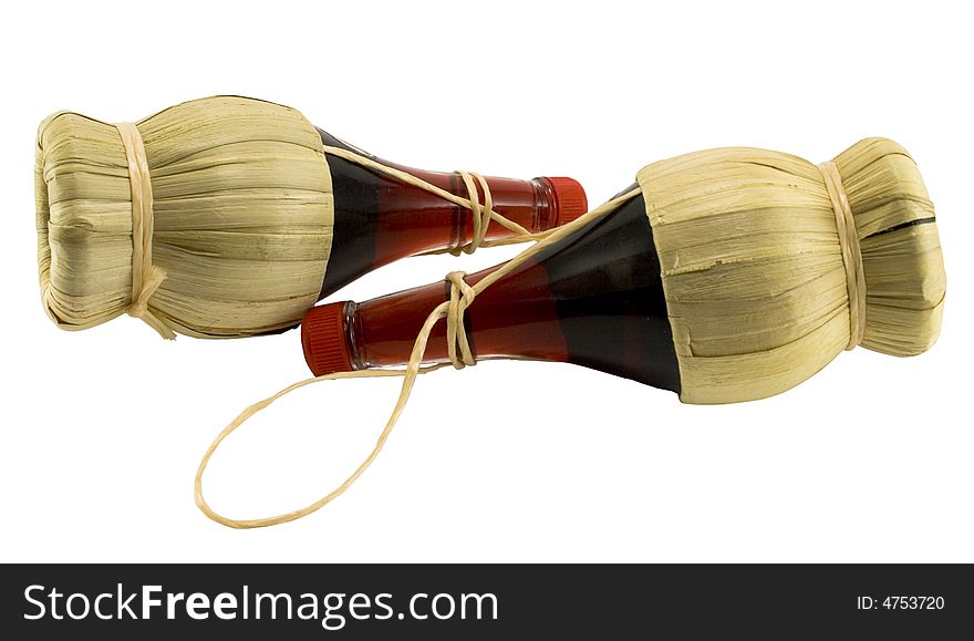 Two bottles of red wine isolated on white