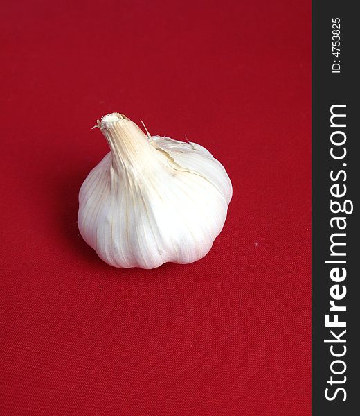 Garlic In A Red Background