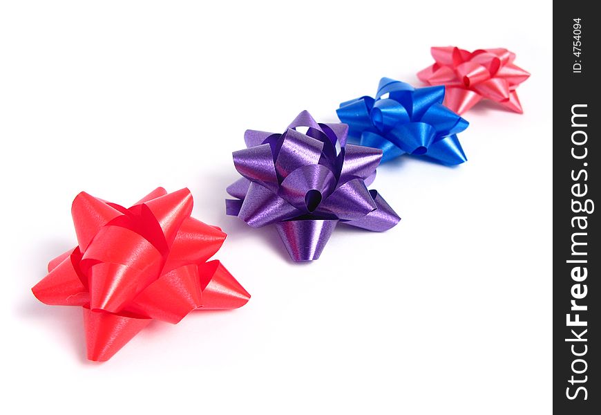 Four colorful gift Bows in white background. Four colorful gift Bows in white background.
