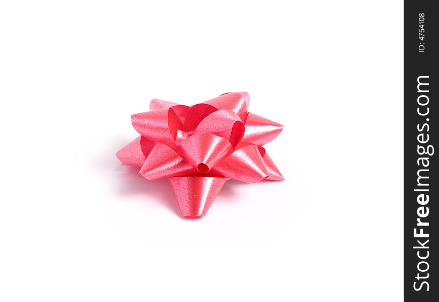 Pink gift Bow in white background.