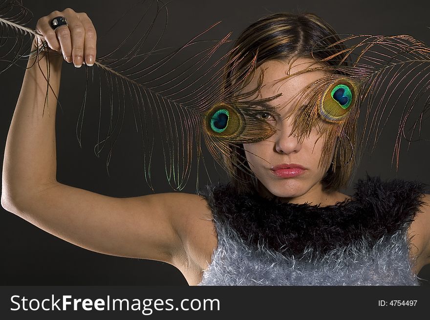 Fashion Model With Feather