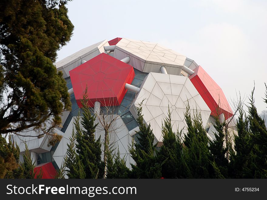 A modern red white ball building in Dalian, China. A modern red white ball building in Dalian, China.