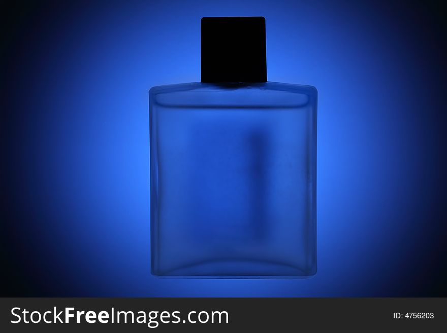 Perfumes Flask Over Blue Background
