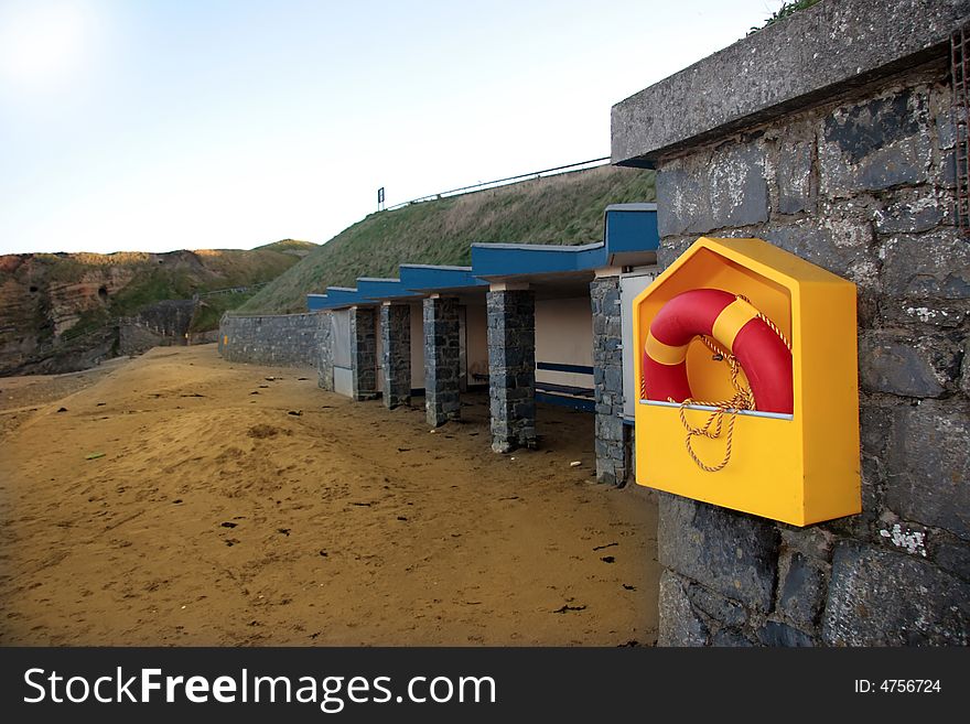 A rescue buoy at a beach in ireland. A rescue buoy at a beach in ireland