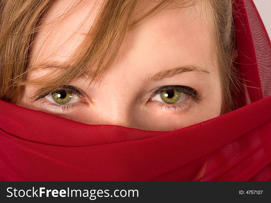 Woman with red paranja eyes