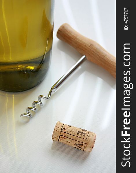 Wine Bottle with corkscrew and cork