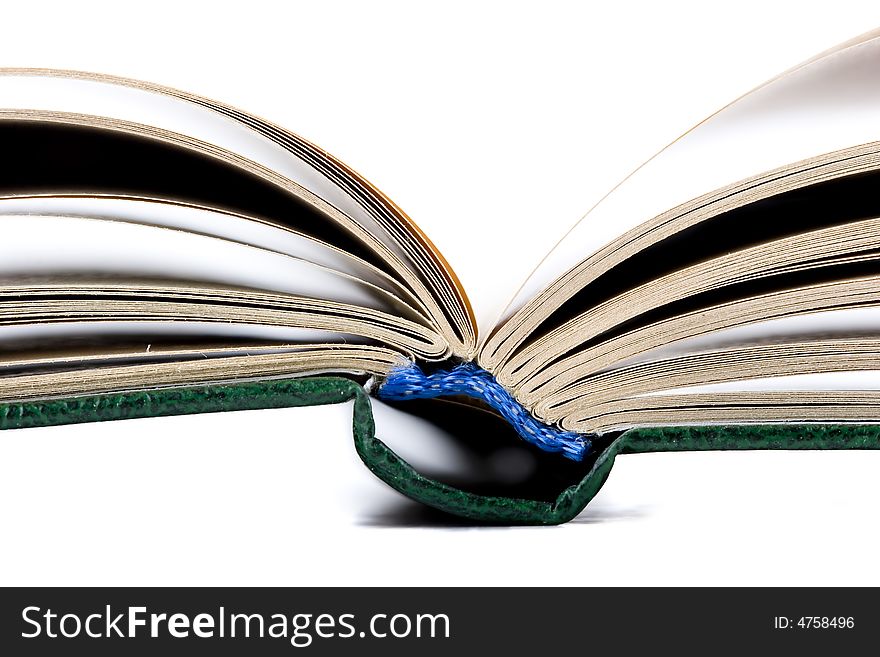 Open old book isolated on the white background