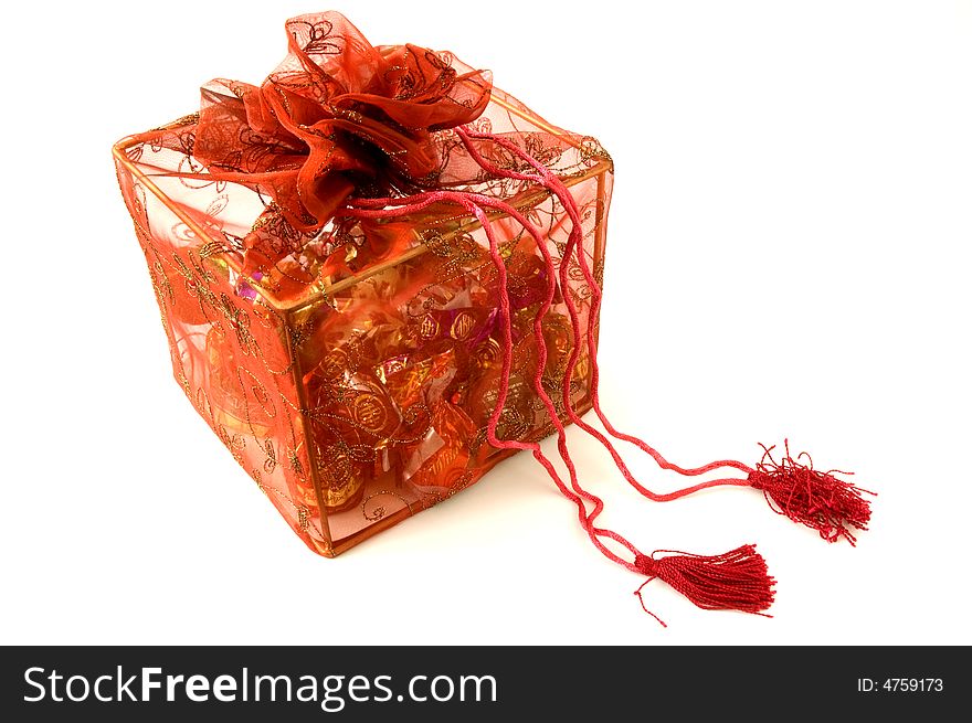 Red gift box with red bow on a white background