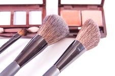 Makeup Brush And Colorful Cosmetics Royalty Free Stock Photo